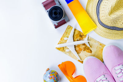 High angle view of various objects over white background