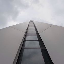 Low angle view of skyscraper against sky