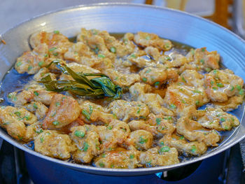 High angle view of meat in bowl on table