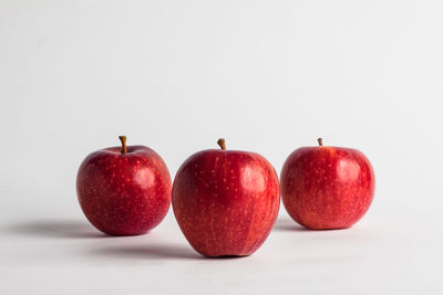 Close-up of apples on white background