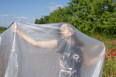 Rear view of woman with umbrella