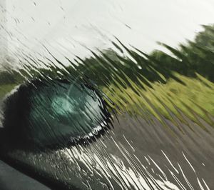 Close-up of water drops on glass