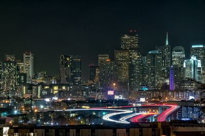 Aerial view of illuminated buildings at night