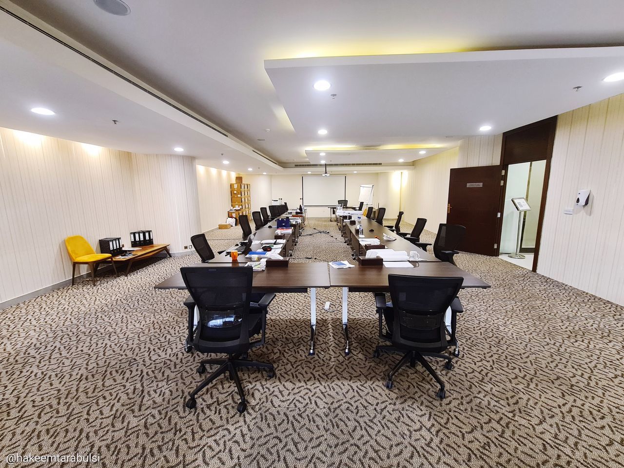conference hall, seat, chair, indoors, room, table, architecture, business, interior design, furniture, office, building, lobby, built structure, home interior, carpet, luxury, lighting equipment, no people, wealth, floor, office chair, ceiling, domestic room