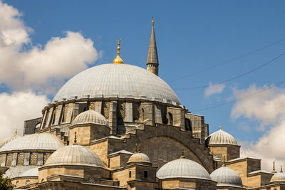 Low angle view of mosque against sky