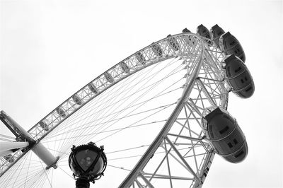 Low angle view of millennium wheel against sky
