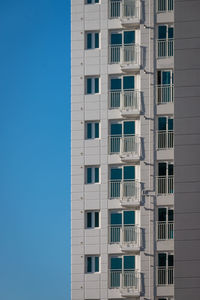 Low angle view of building against blue sky