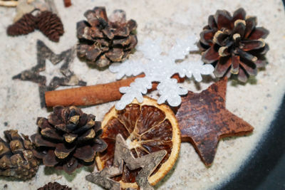 High angle view of pine cone on table