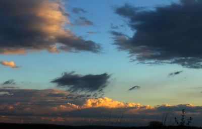 Scenic view of dramatic sky at sunset