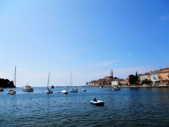 Boats sailing in sea