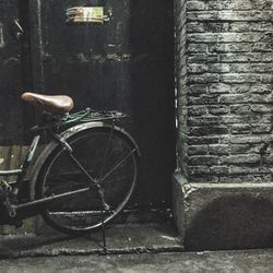 Bicycle parked on sidewalk