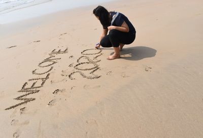 Full length of woman on beach