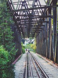 Railroad track leading to bridge
