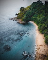 High angle view of surf on shore