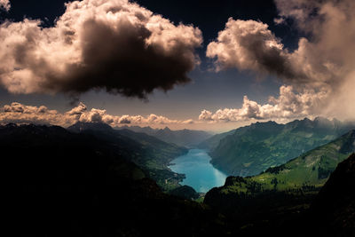 Scenic view of mountains against sky during sunset