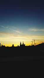 Silhouette landscape against sky during sunset