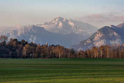 Scenic view of snowcapped mountains against sky