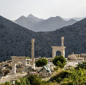 View of historic building against mountain range