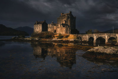 Scottish castle in sunlight on a stormy day