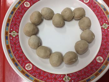 High angle view of eggs in plate on table