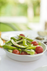 Close-up of fruits in plate on table