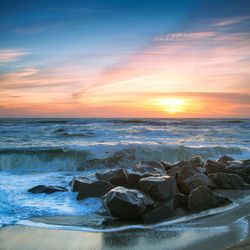 Scenic view of sea against sky during sunset