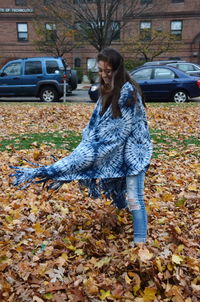 Full length of woman standing in park