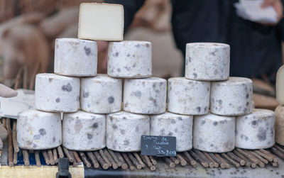 Stack of cheese for sale