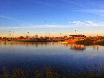 Scenic view of lake against sky during sunset