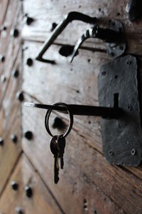 Low angle view of old metal door