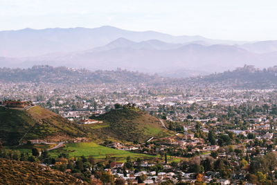 Aerial view of cityscape against sky