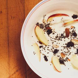 High angle view of fruits in plate on table