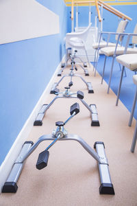 High angle view of machinery and chairs on floor