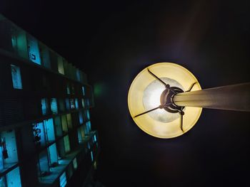 Directly below shot of illuminate street light at night