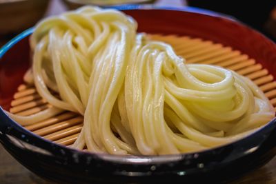 Close-up of noodles in bowl on table