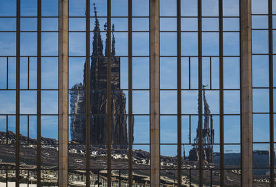 Reflection of building on glass