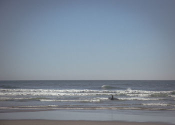 Scenic view of sea against clear sky