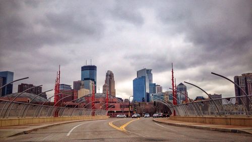 City street against cloudy sky