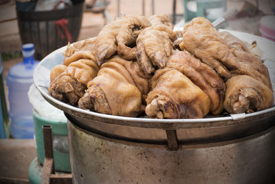 Close-up of bread in container for sale at market
