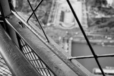 High angle view of wet railing