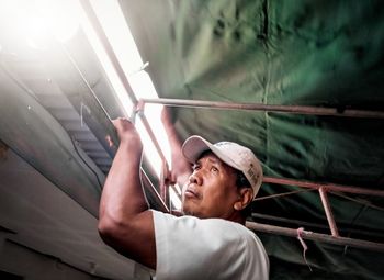 Low angle view of man working