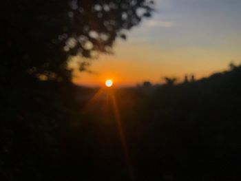 Scenic view of silhouette landscape against sky during sunset