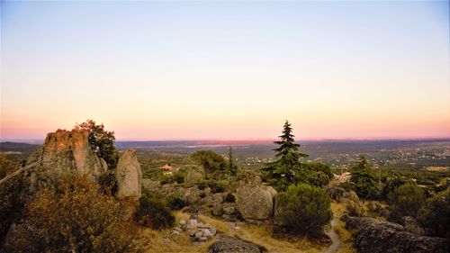 Scenic view of landscape against sky during sunset