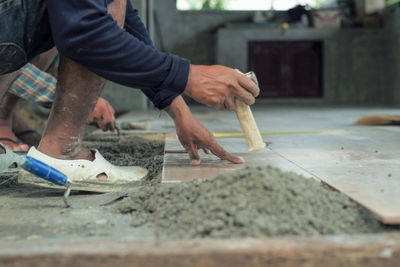 Man working at fish in city