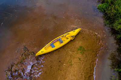 High angle view of yellow floating on river