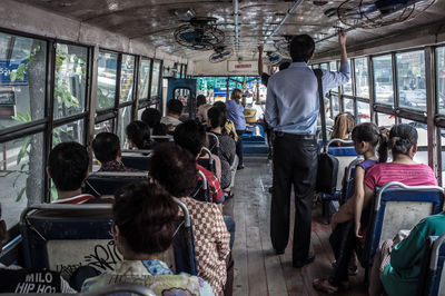 People traveling in bus