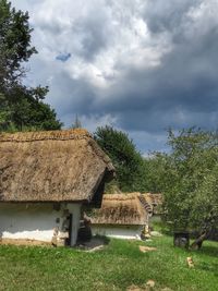 House on field against sky