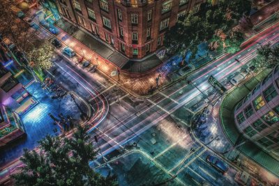 High angle view of light trails on road at night