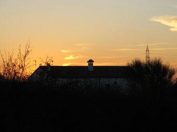 View of built structure at sunset