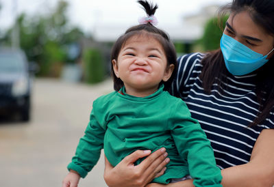 Portrait of cute smiling girl outdoors